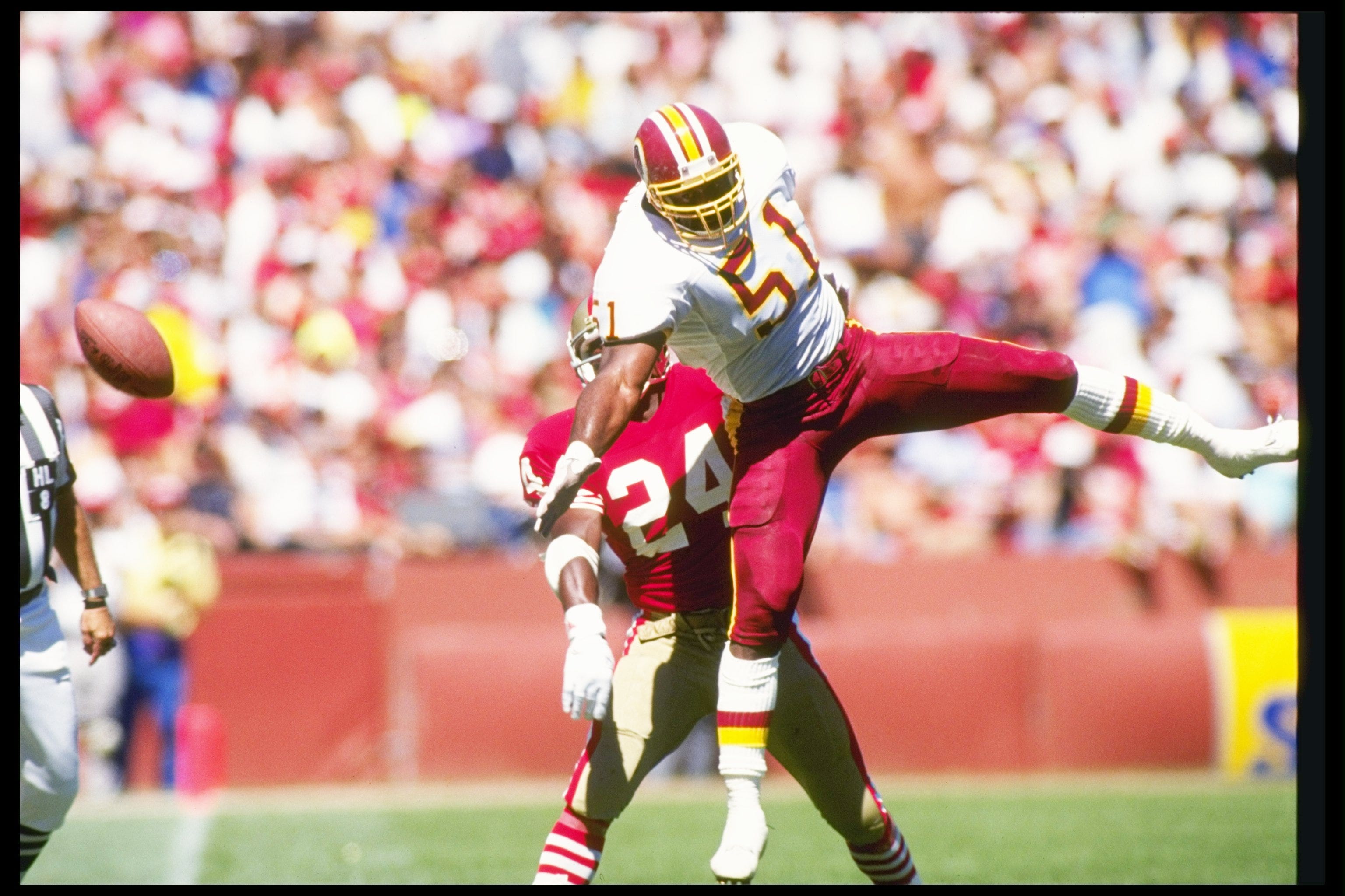 16 Sep 1990: Linebacker Monte Coleman of the Washington Redskins jumps to block a pass during a game against the San Francisco 49ers at Candlestick Park in San Francisco, California. The 49ers won the game, 26-13. Mandatory Credit: Otto Greule Jr. /All