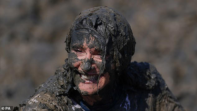One competitor looked like she had a mud mask after making her way through the river&nbsp;