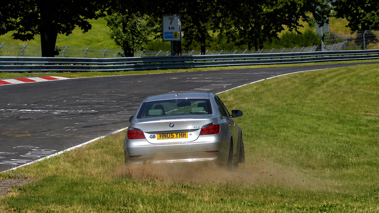 This BMW 5 Series makes a smooth off-track save