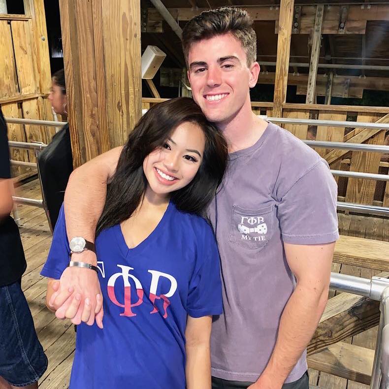 Danh smiling alongside her husband, Luke Gradl. Facebook/Luke Gradl