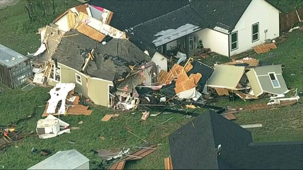 Tornadoes leave at least 2 dead and destroy dozens of homes across ...