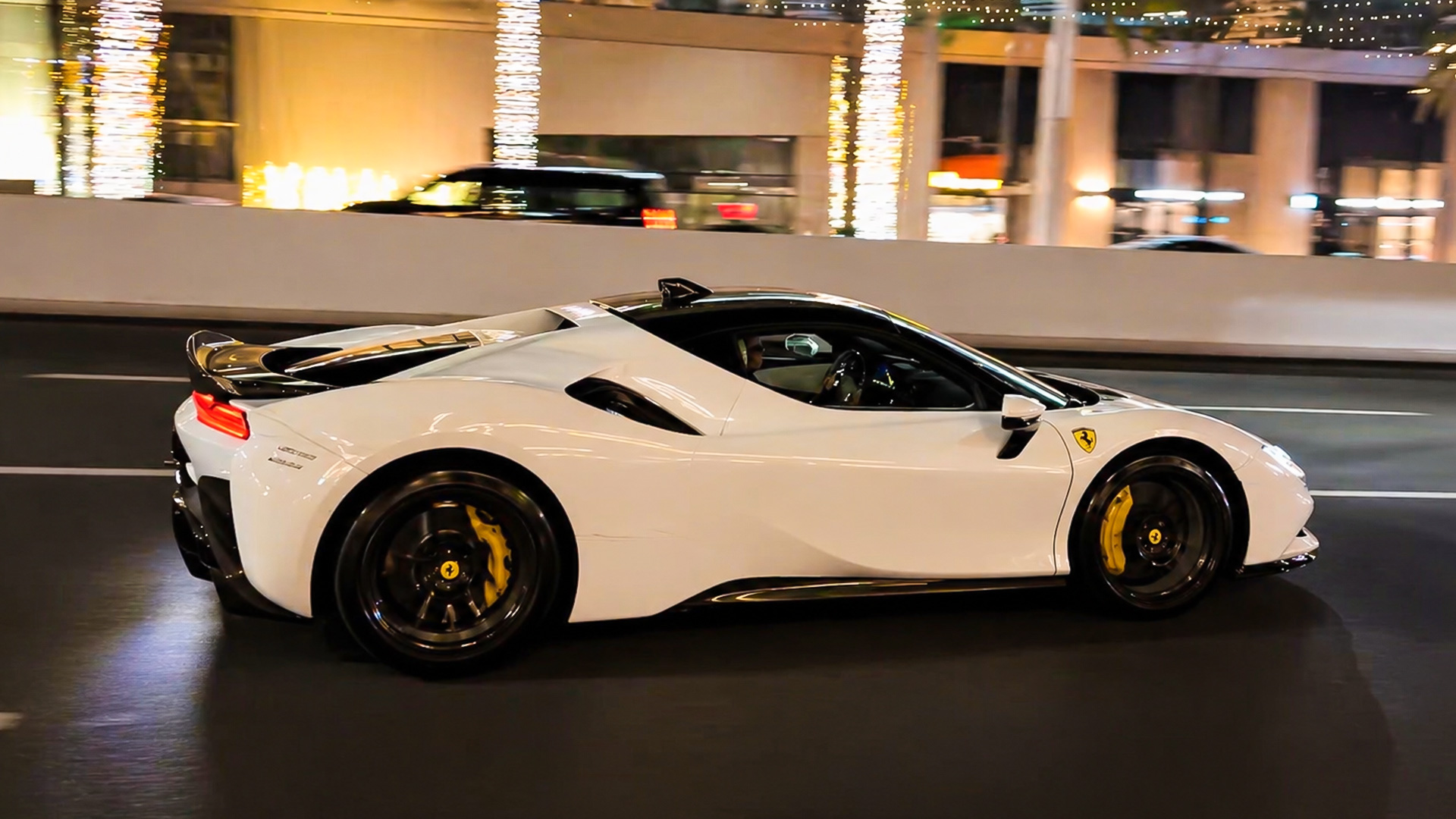 Billionaire moves Ferrari SF90 Stradale along Dubai road