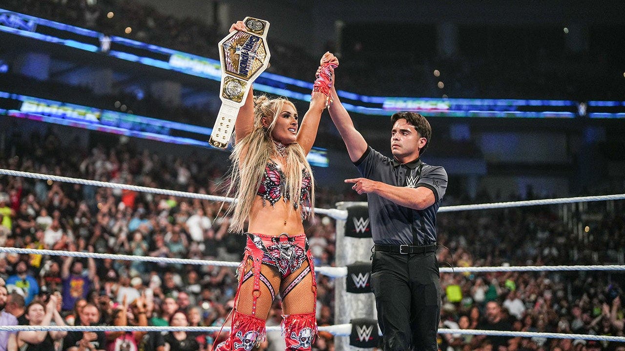 WWE US champion Tiffany Stratton takes her new belt for a celebratory ...