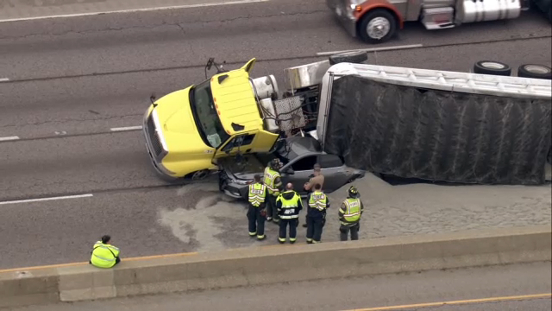 Dump truck rolls onto car on Eisenhower Expressway in west suburbs ...