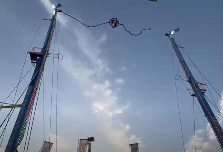 Fairground horror in Spain: Slingshot ride's cable snaps midair in ...