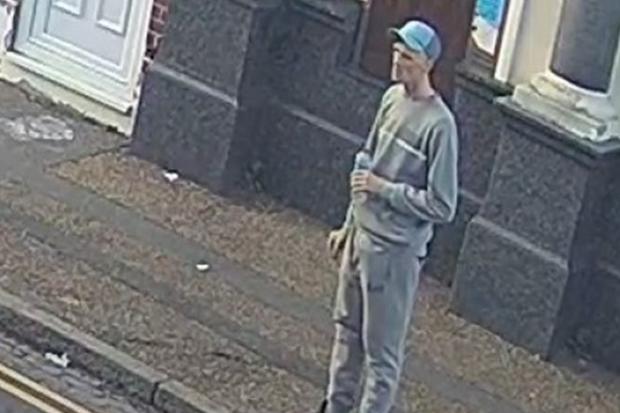 Search for man as woman dies in alleyway in 'unexplained' circumstances