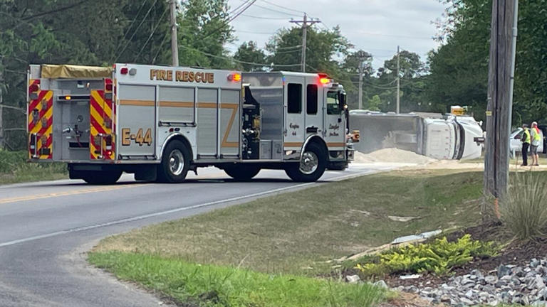 Overturned dump truck closes parts of Pine Log Road