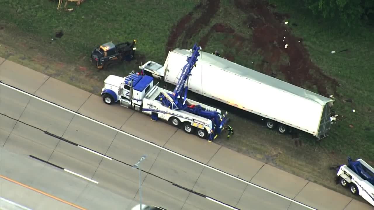 Crews work to clear semi after rollover crash off Kilpatrick Turnpike ...