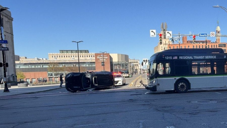 Driver hospitalized after collision between car and RTS bus