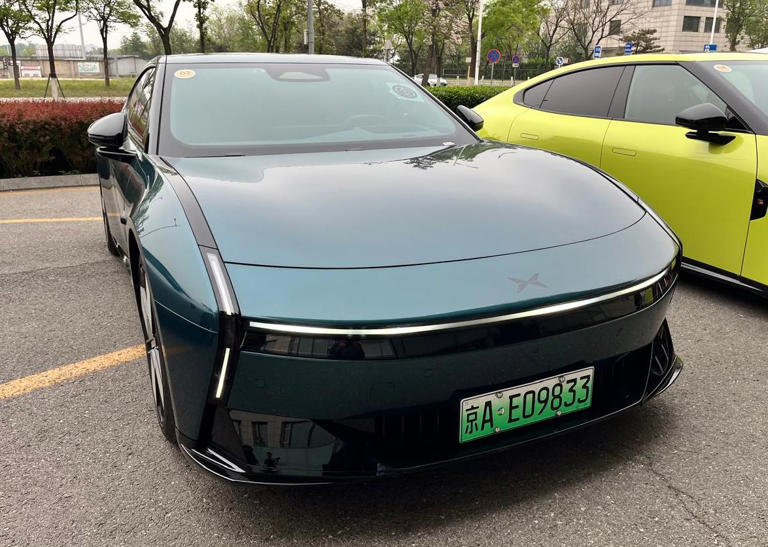 Sensasi disetirin mobil di jalanan kota Beijing. Benar-benar bikin takjub!