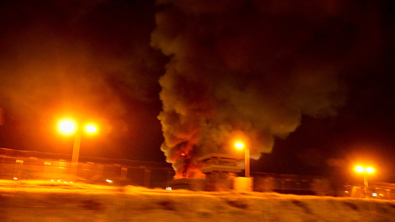 An explosion occurred near the U.S. Consulate and Erbil International Airport, where a U.S. military base is located, in Erbil, Iraq, on March 12, 2026, causing fire and thick smoke to rise following the blast.