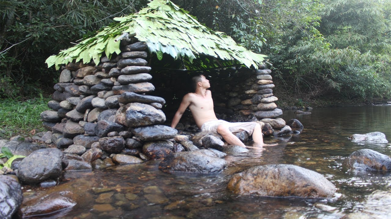 Primitive technology stone hut build