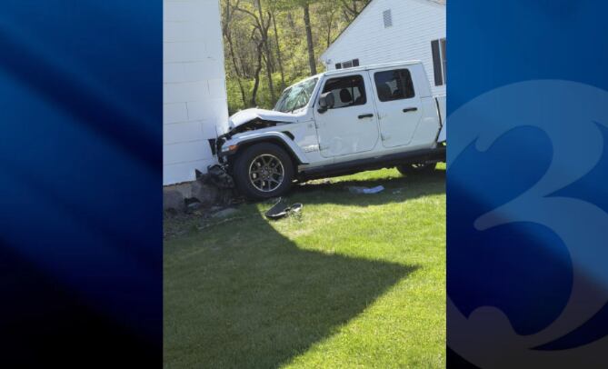 Driver hospitalized after car crashes into Naugatuck home