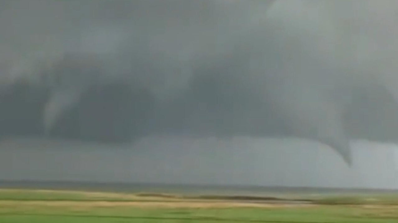 Storm chasers capture twin tornadoes as severe weather moves through ...