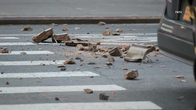 Chunks of stone and façade fall from Manhattan high-rise onto cars and ...