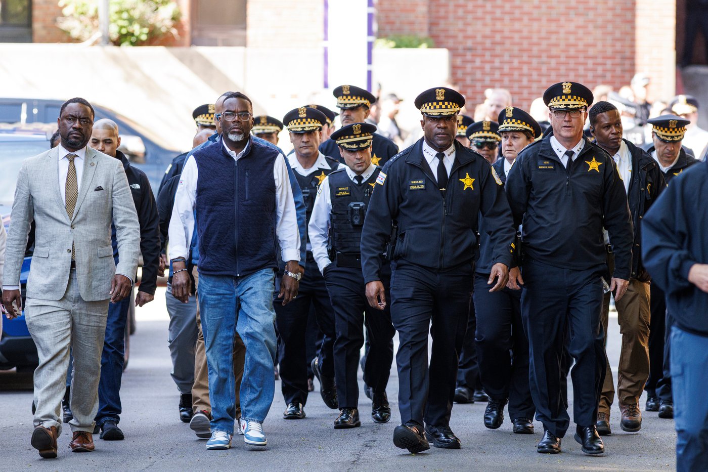 Suspect in shooting of 2 Chicago officers allegedly pulled handgun from ...