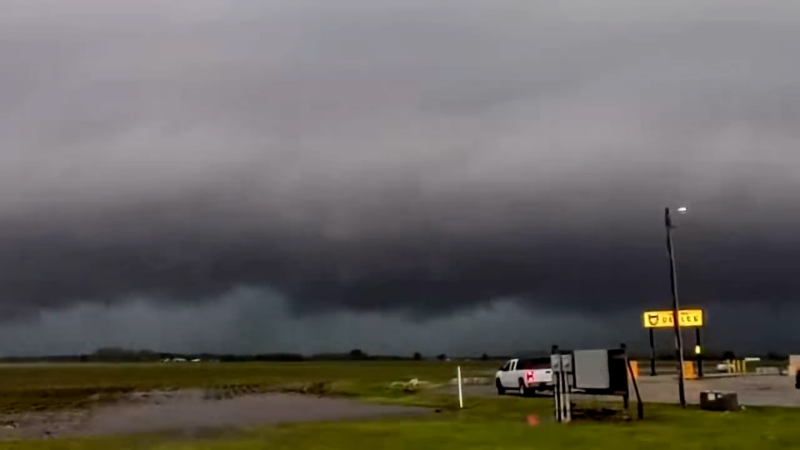 Tornado sirens blare as wall cloud hovers in Illinois sky