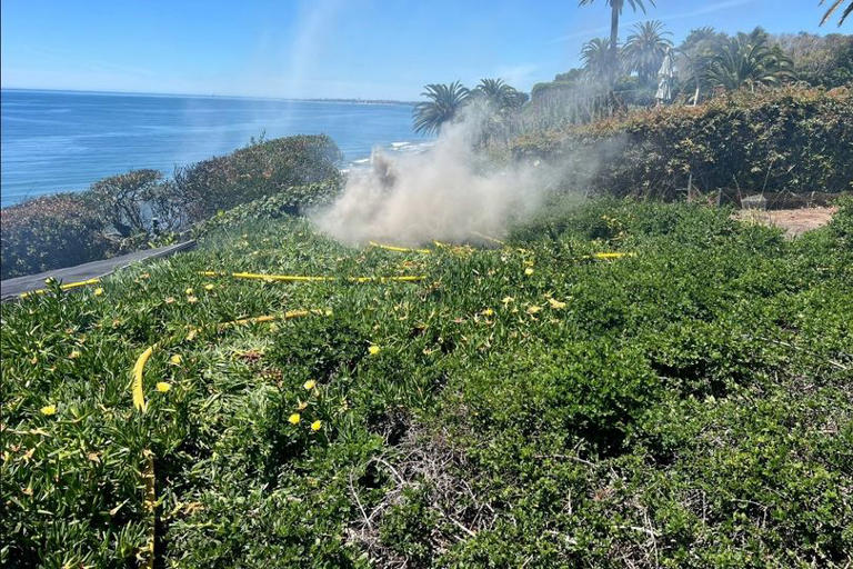 Smoke pours from 'volcano' at California beach in ultra-rare geological ...