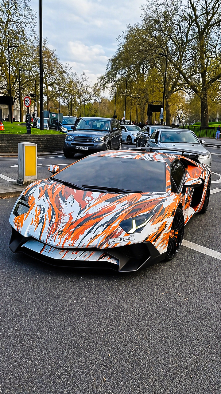 Lamborghini wearing a bold livery on city streets