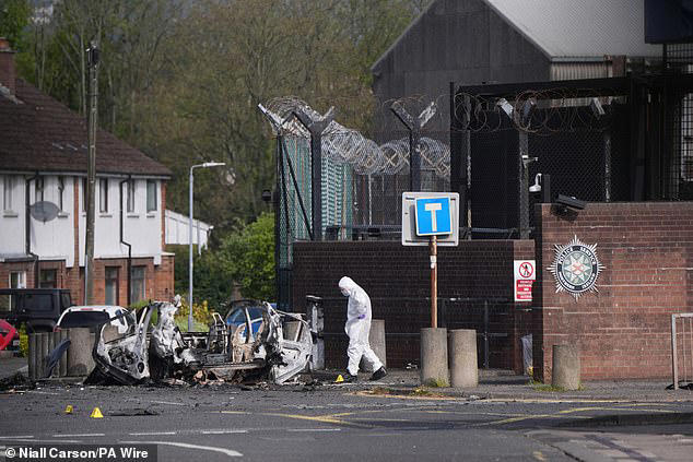 Moment car bomb explodes outside Belfast police station in attack ...