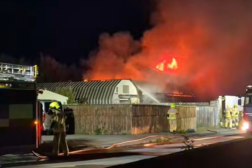 Business owners in state of panic as building bursts into flames