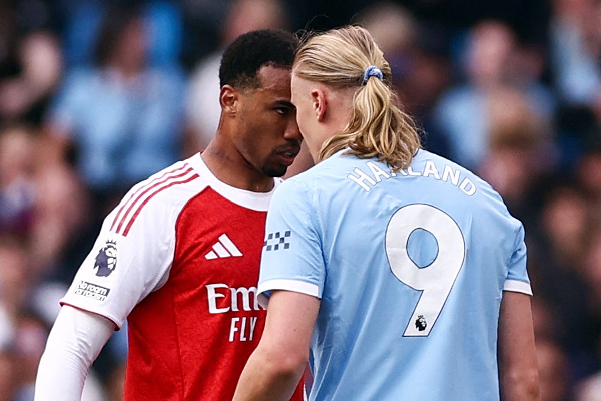 Tension in title race as Man City and Arsenal await rearranged games