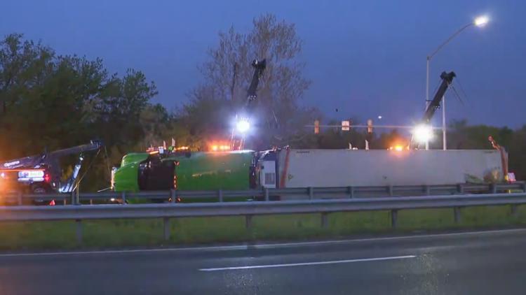 Tractor trailer overturns on I-270 after driver tries to avoid a deer