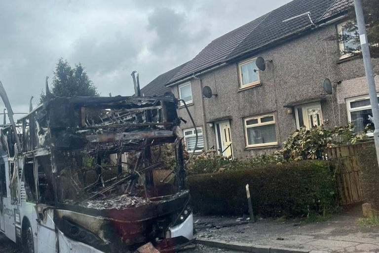 Double-decker on fire as bus destroyed in early morning rush hour chaos