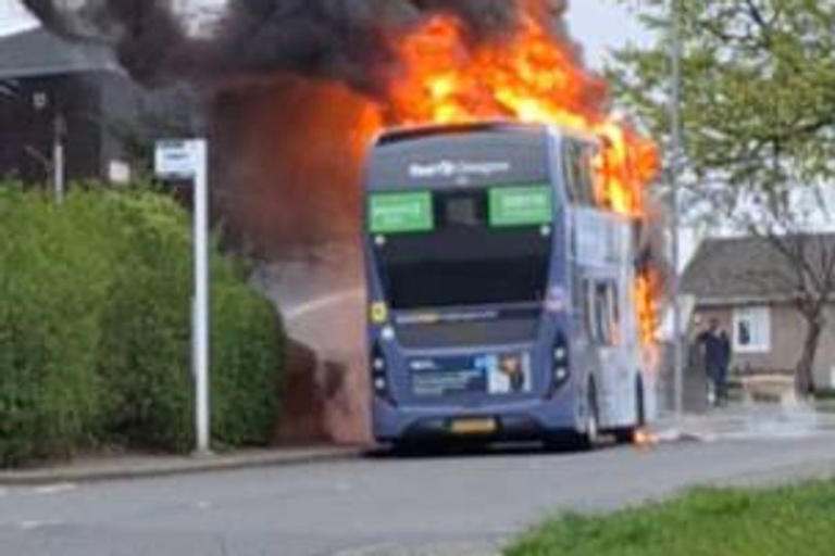 Double-decker on fire as bus destroyed in early morning rush hour chaos