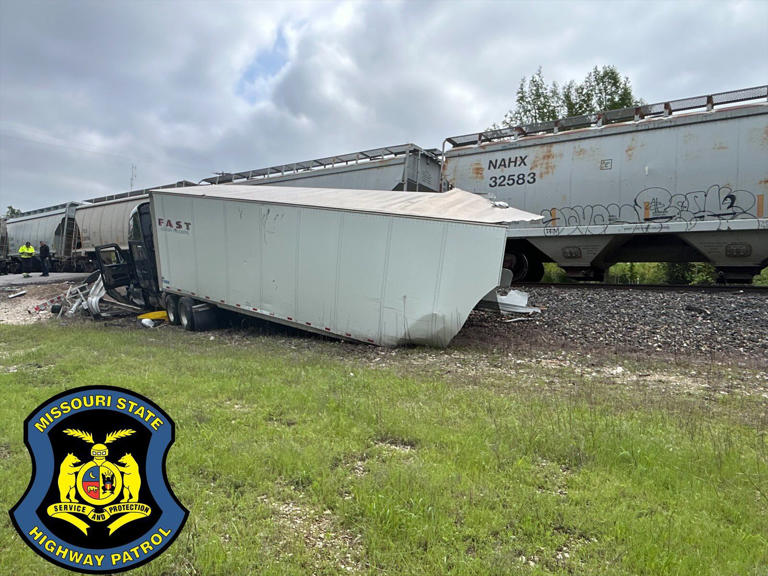 Road closed in Cass County after semi stuck on railroad tracks was hit ...
