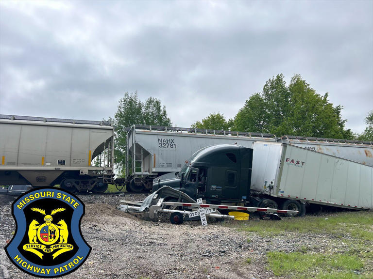 Road closed in Cass County after semi stuck on railroad tracks was hit ...