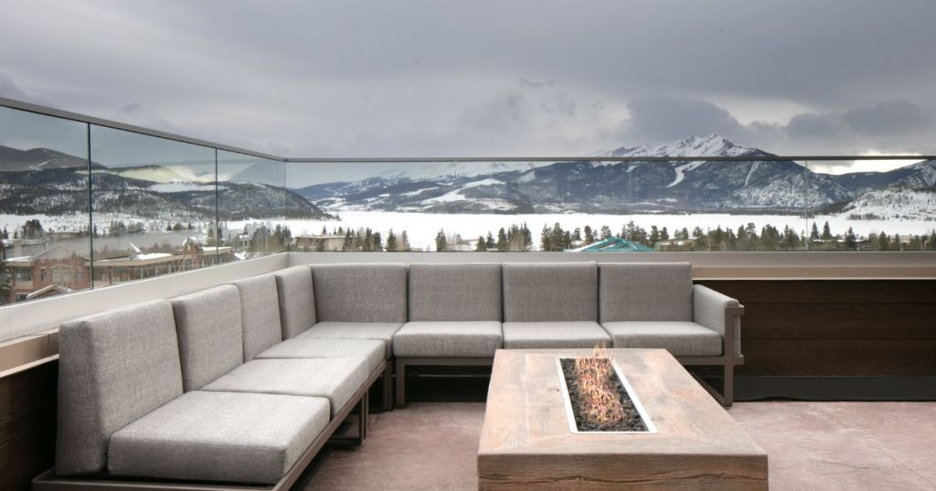 Snowy mountain views from Vue Rooftop in Dillon, Colorado.