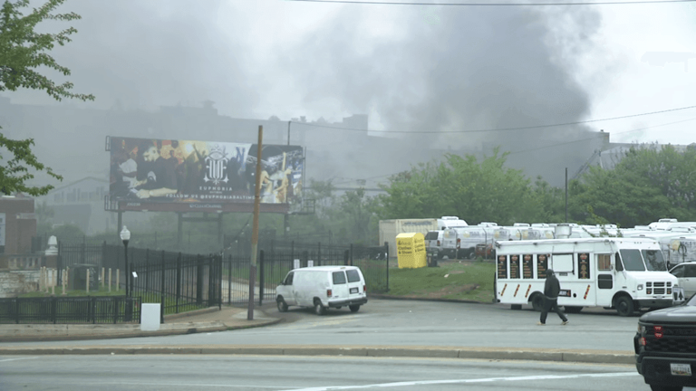 Crews battle fire at warehouse in southeast Baltimore
