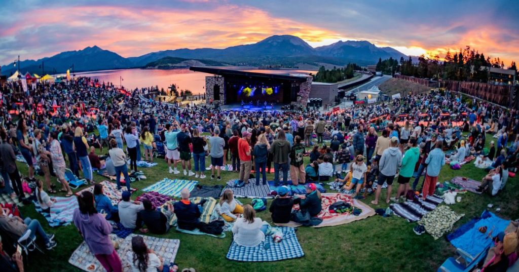 A jam-packed lawn during sunset at the Dillon Amphitheater in Dillon, Colorado.