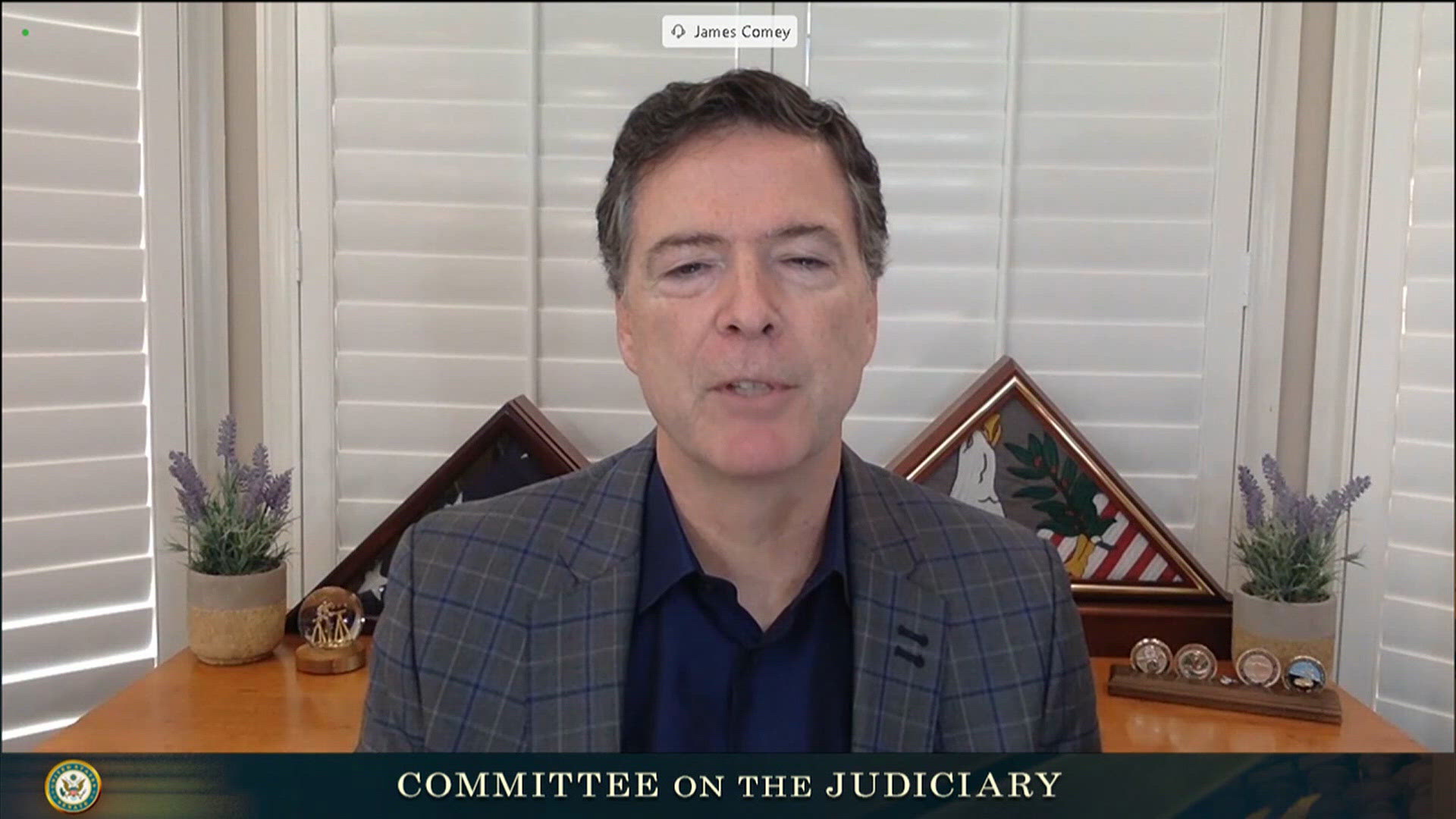 Former FBI director James Comey indicted over alleged threat against Trump