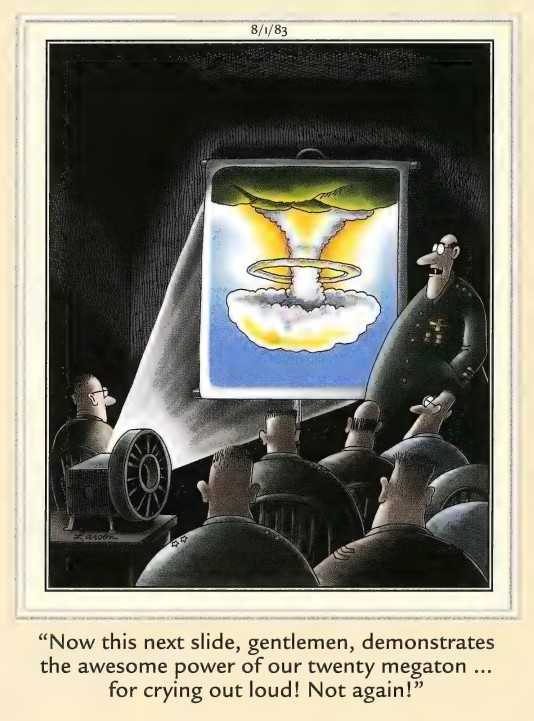 A military general is frustrated that the slides for a presentation are upside-down in Gary Larson's The Far Side.
