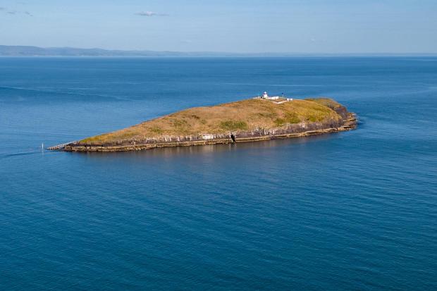 Remote island with 200-year-old lighthouse off North Wales coast home ...