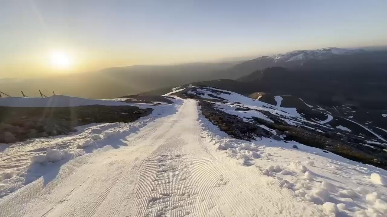 Skiers hit the slopes at dawn as late snow extends season