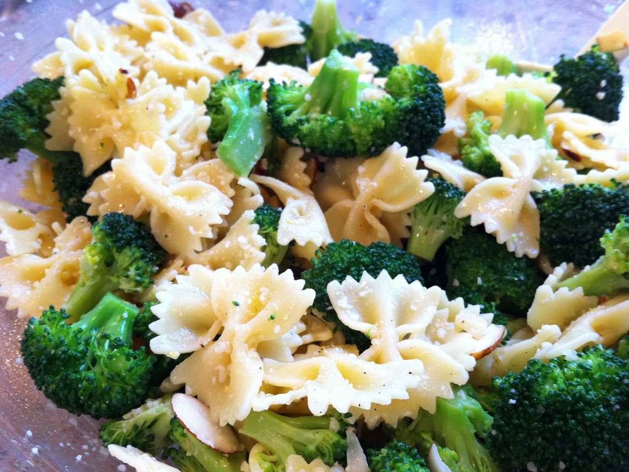 close up view of Bow Tie Pasta with Broccoli, Garlic, and Lemon in a glass bowl
