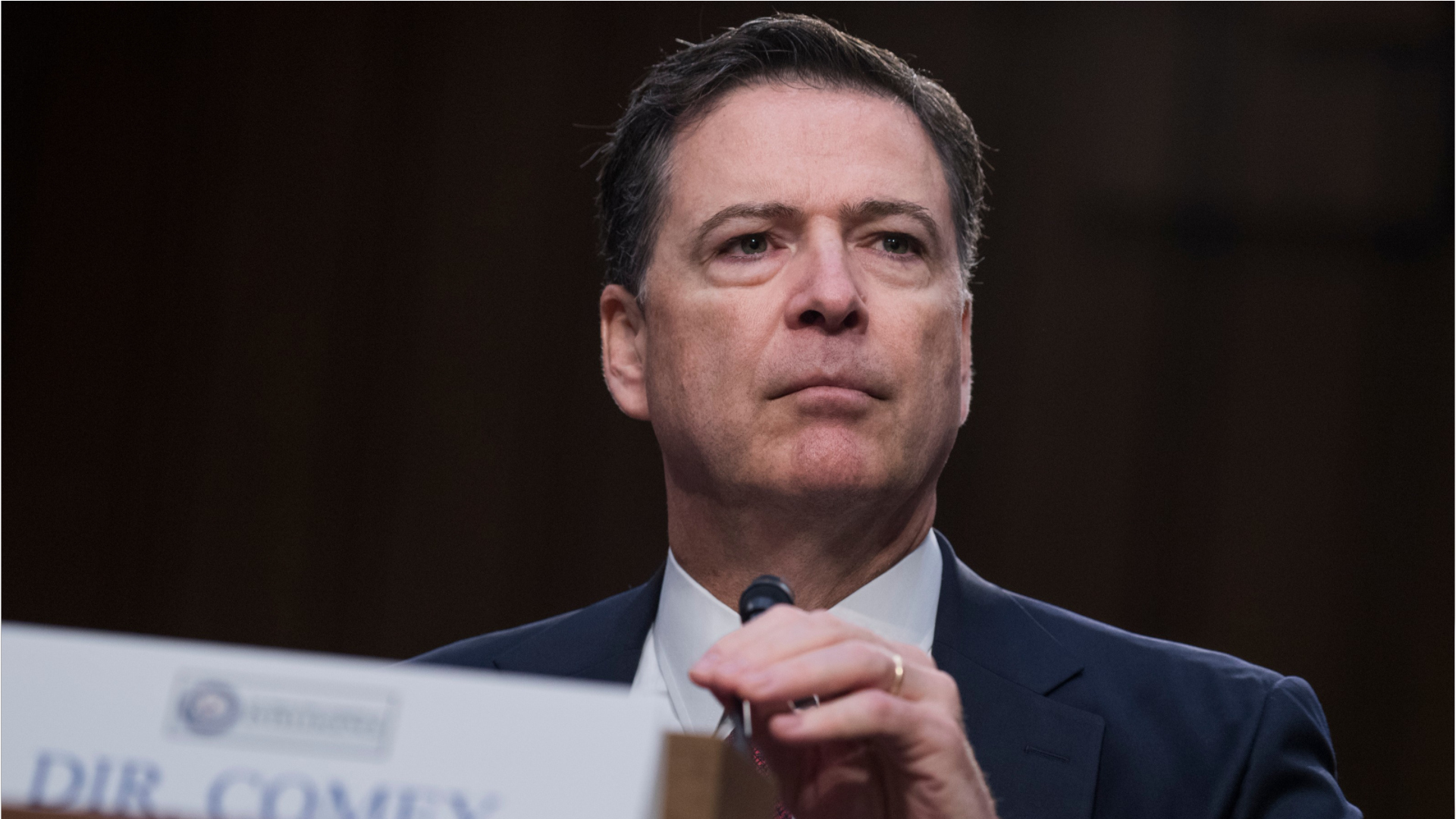 James Comey charged over alleged threat to Trump in social media post