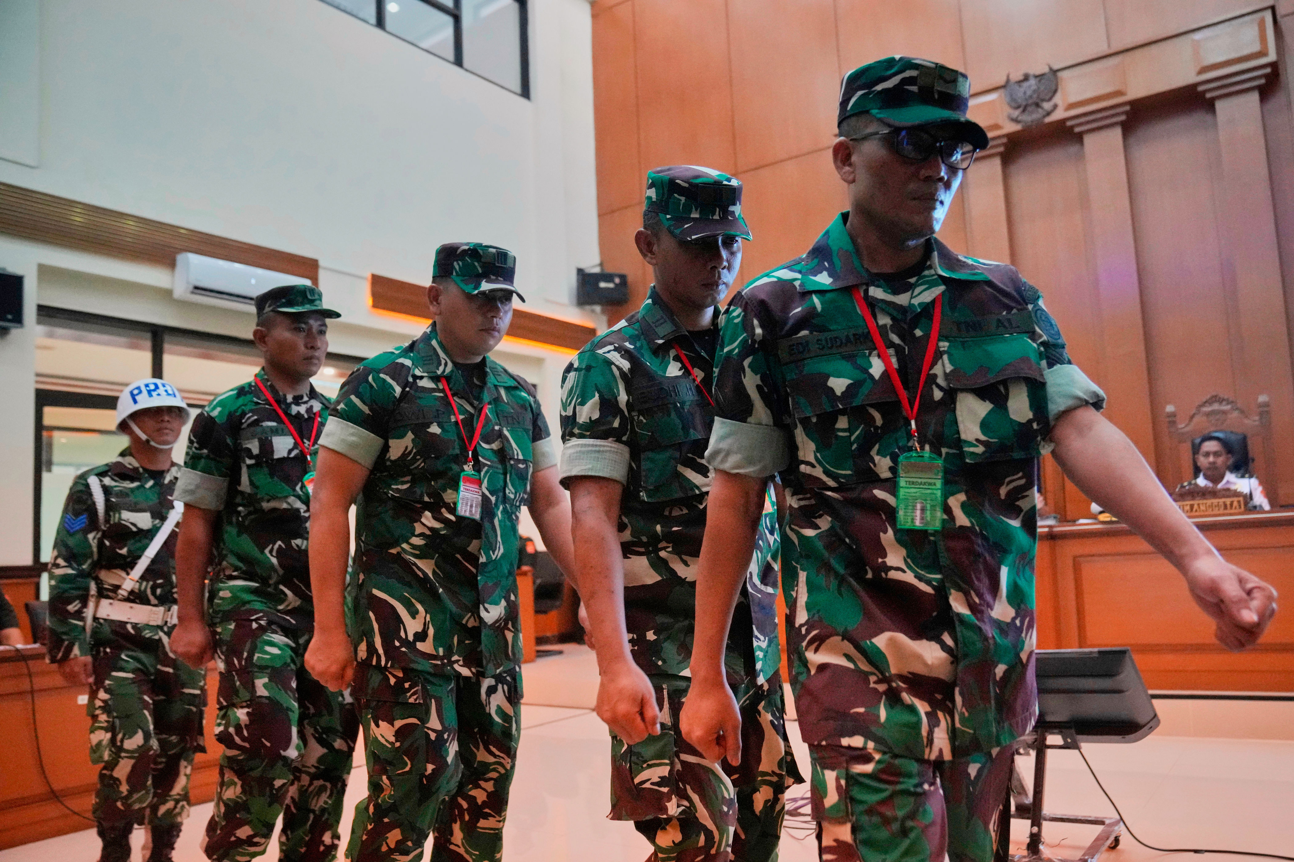 Indonesia puts four soldiers on trial over acid attack on activist