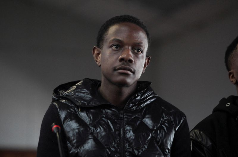 Bellarmine Chatunga Mugabe, son of late Zimbabwean president Robert Mugabe, looks on during his court appearance on attempted murder charges, after a gardener was shot and injured last week at the Johannesburg mansion where Chatunga was staying, at the Alexandra Magistrate's Court in Johannesburg, South Africa February 23, 2026. REUTERS/Oupa Nkosi/File Photo