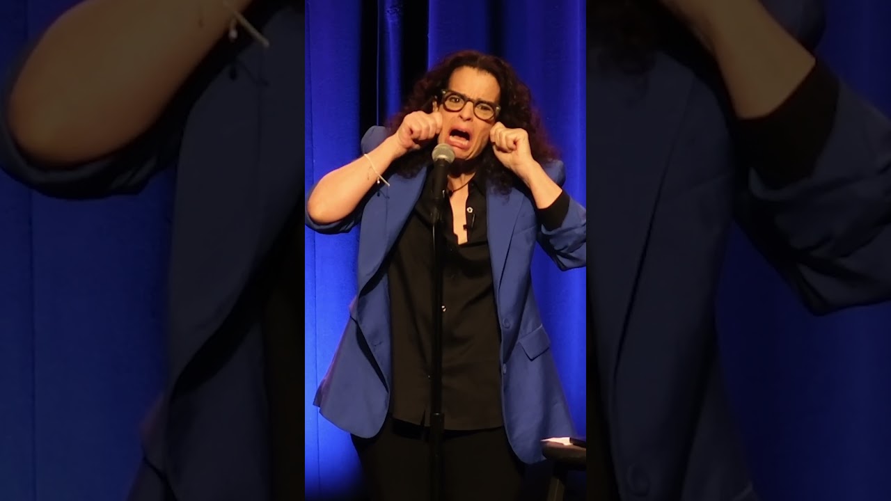 Comedian demonstrates a funny sign-language interpretation for lesbians