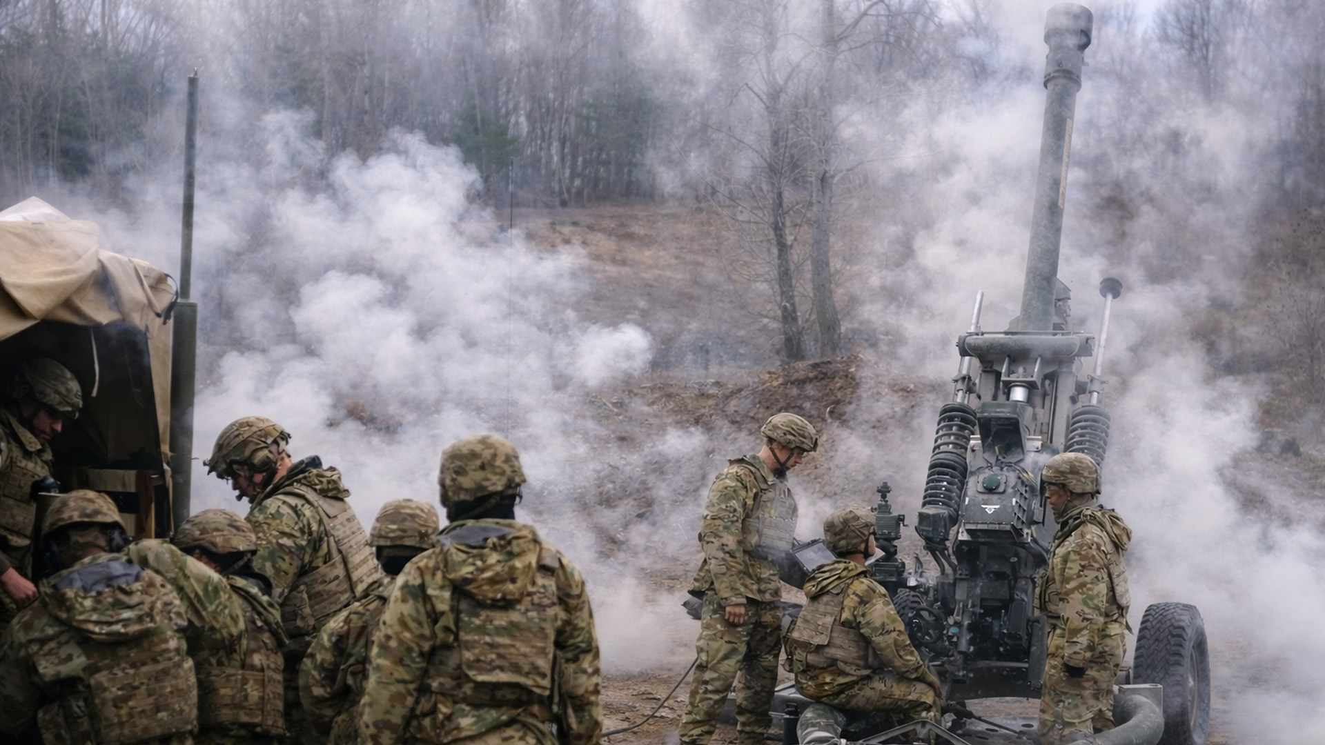 Soldiers operate howitzers in large scale training exercise