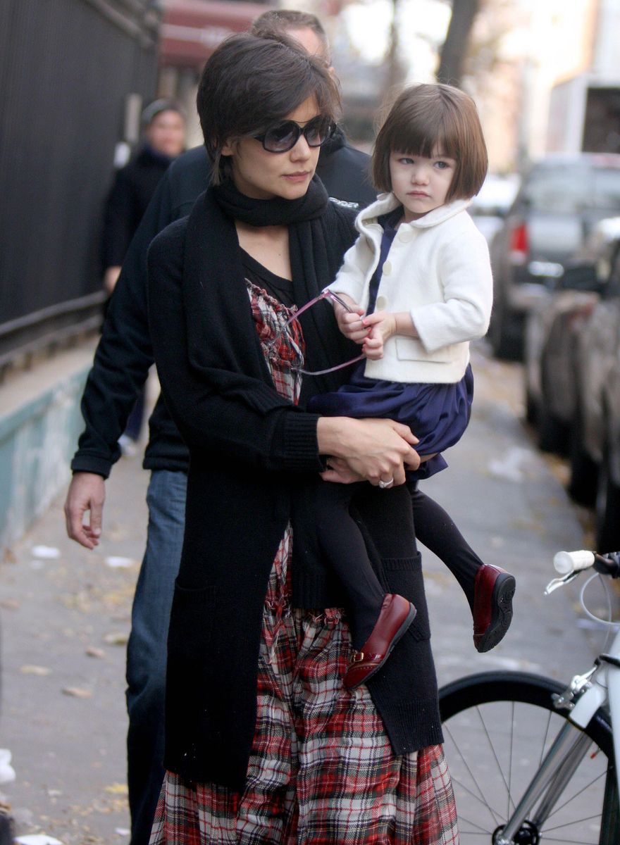 A star is born: Suri Cruise makes her global debut on the legendary October 2006 cover of Vanity Fair.