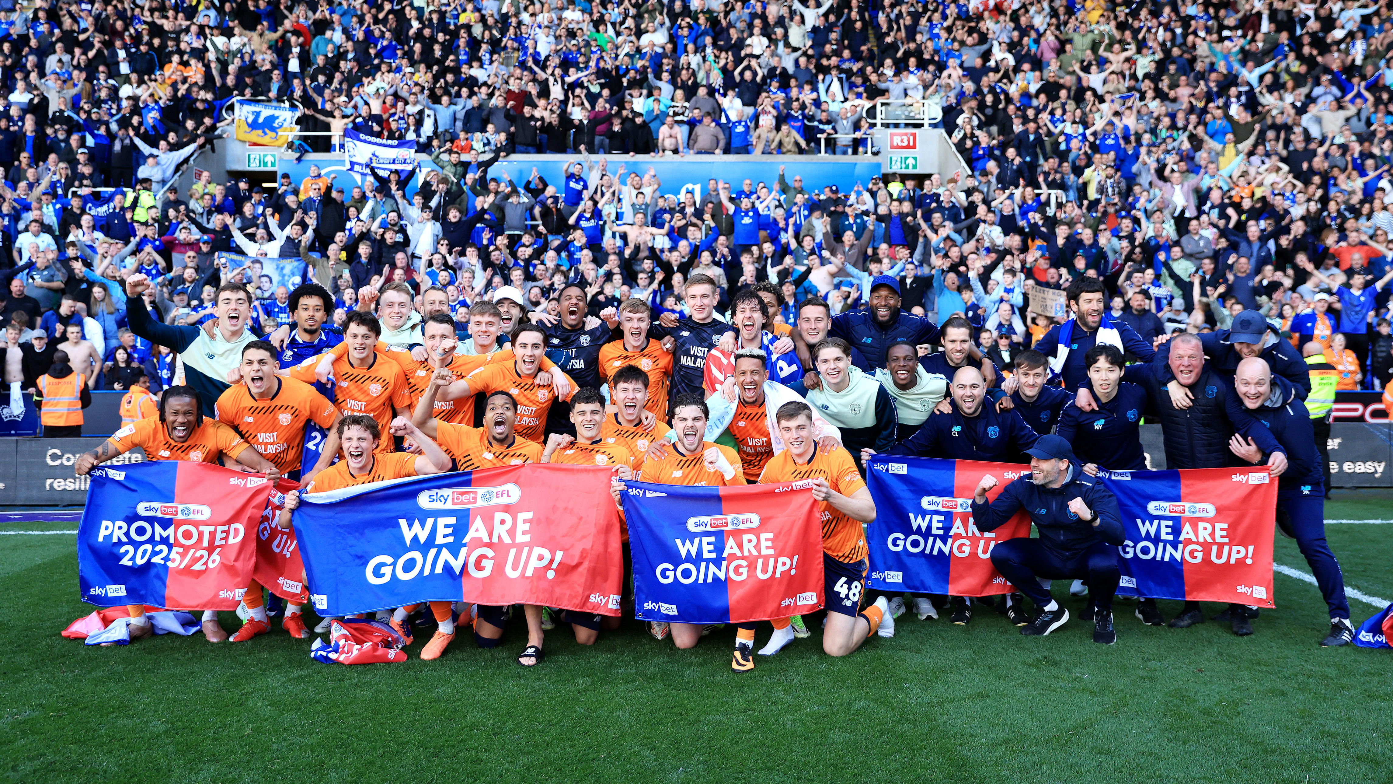 Cardiff promoted after win at Reading and dramatic help from elsewhere