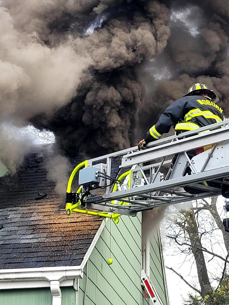 Firefighters knock down house fire in Woburn