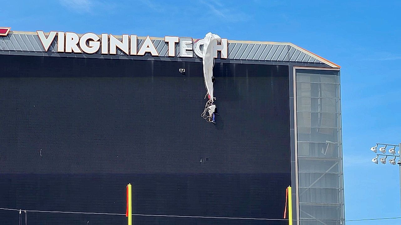 Skydiver rescued after getting caught on scoreboard during Virginia ...