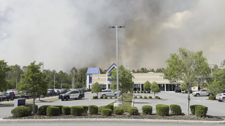 Update: Evacuation orders lifted, roads closed due to growing 75-acre ...