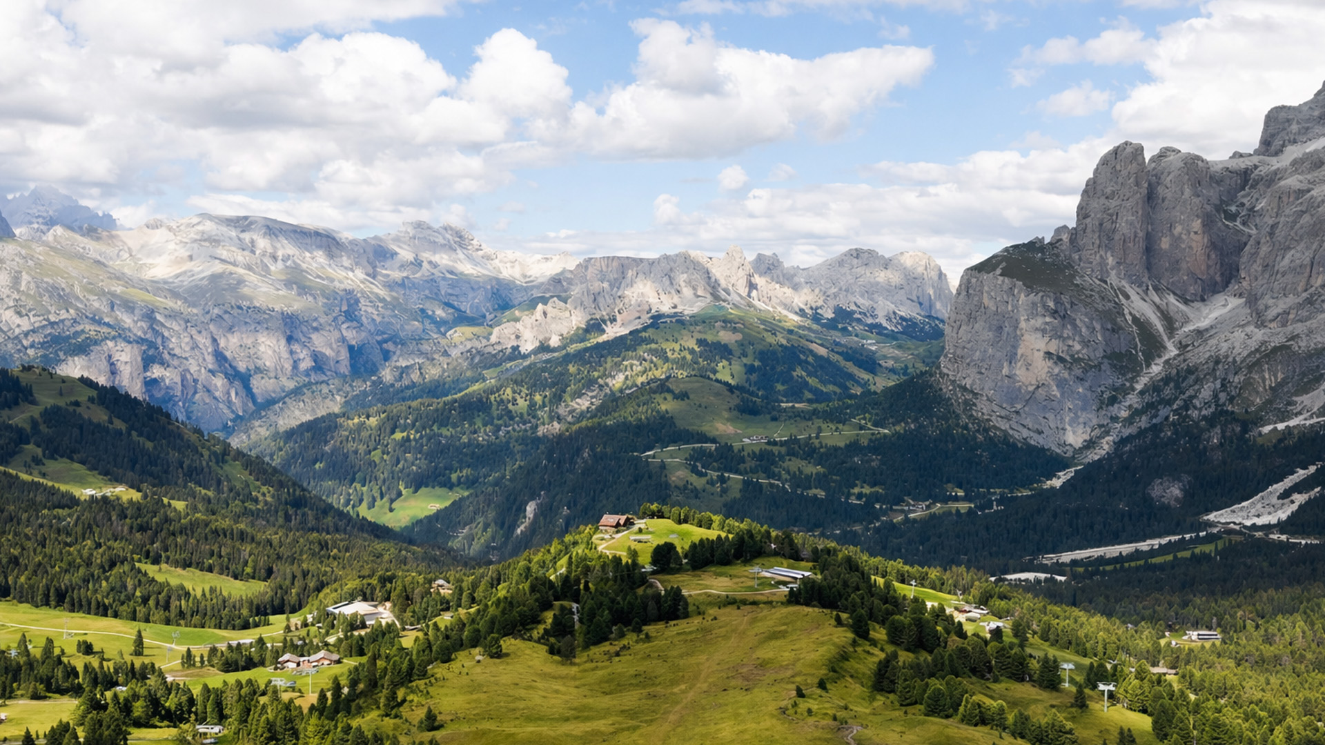 Where mountains meet green fields
